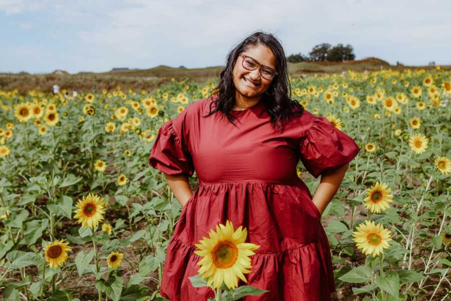 woman who survived abuse in a sunflower field