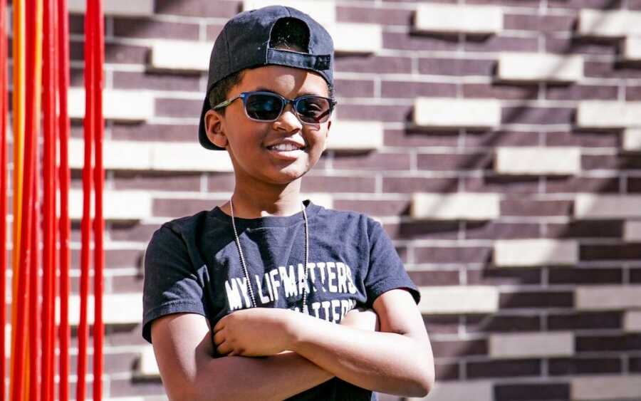 young boy in black shirt 