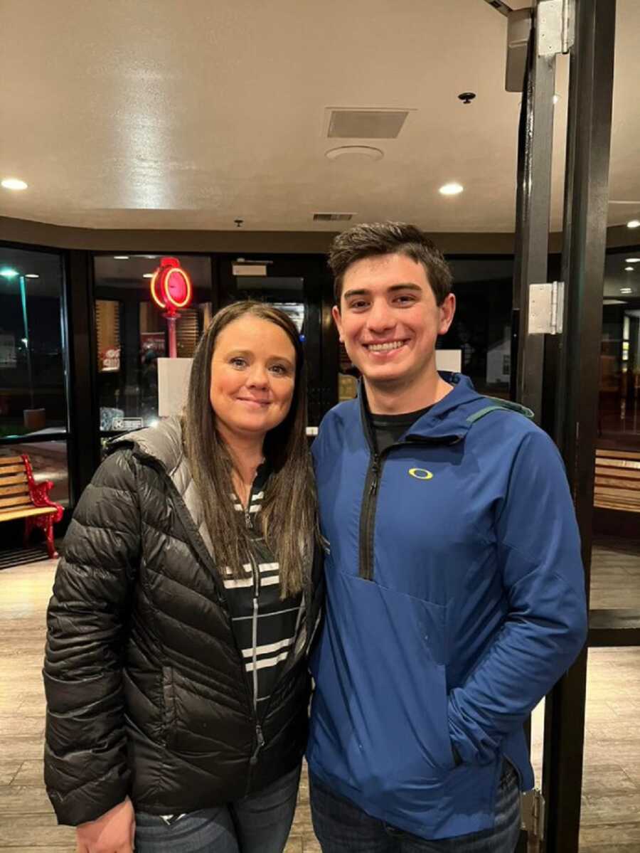 Adoptee takes picture with birth mom, reuniting with her after receiving a message on his 20th birthday.