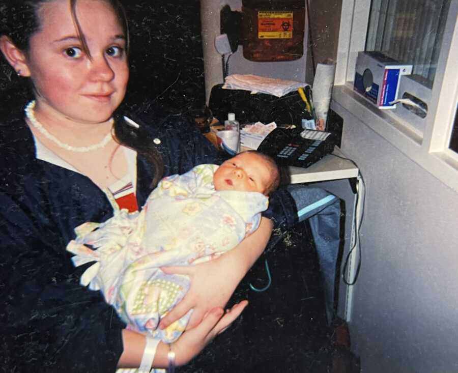 Teen mom holds baby boy she's giving up for adoption.