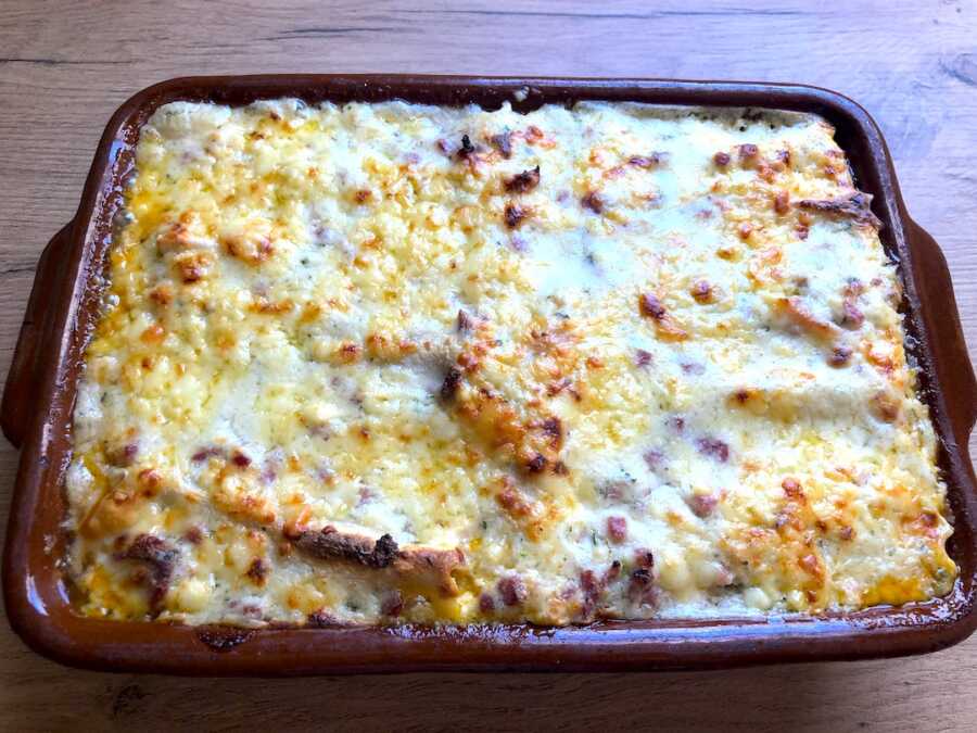 baking dish filled with cooked canelones