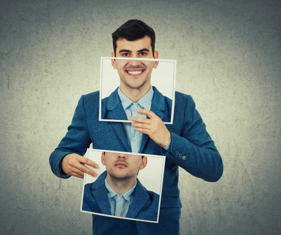 Man holds up different pictures in front of his face to hide his true emotions.