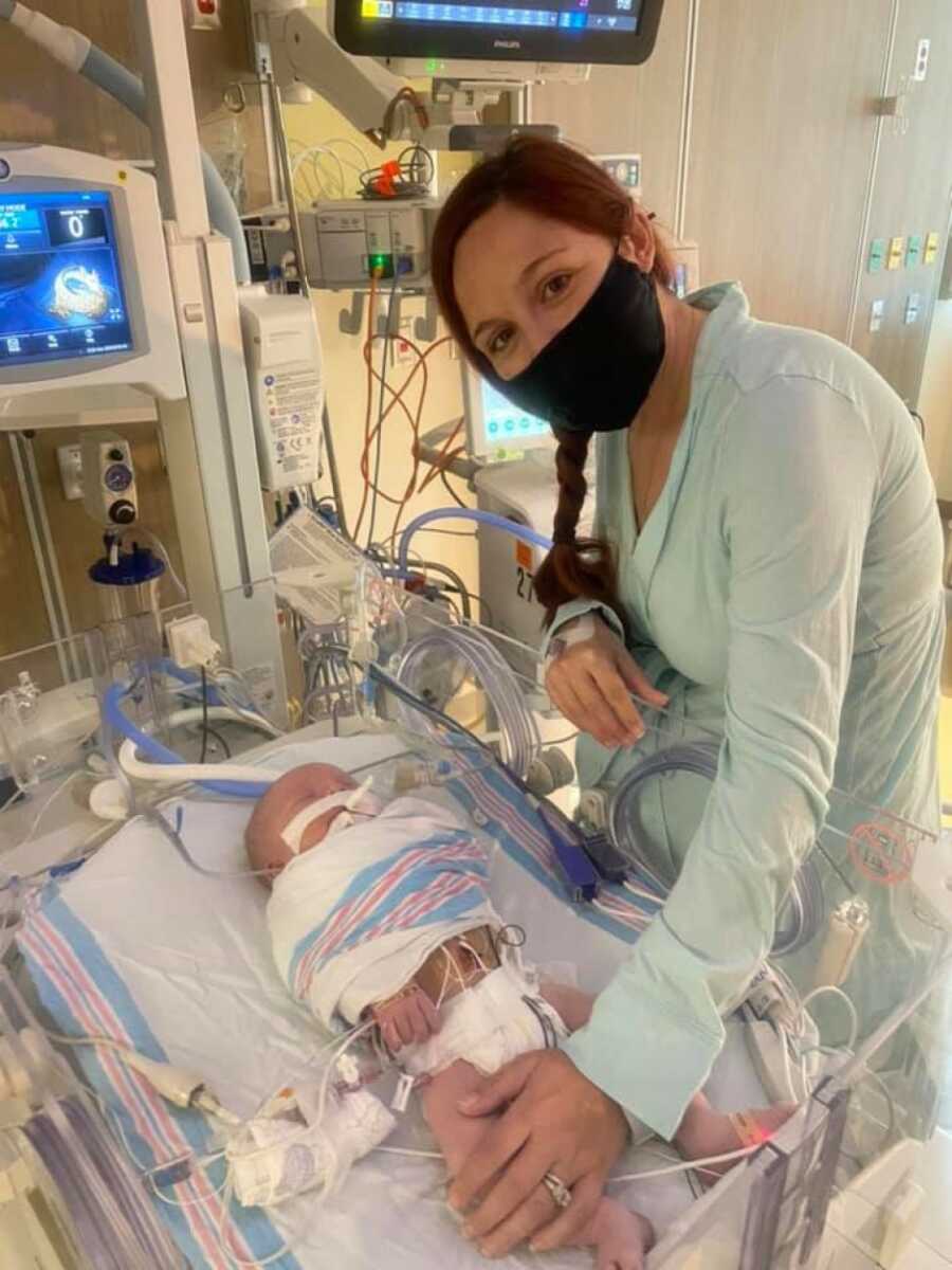 mom watching over her son in NICU