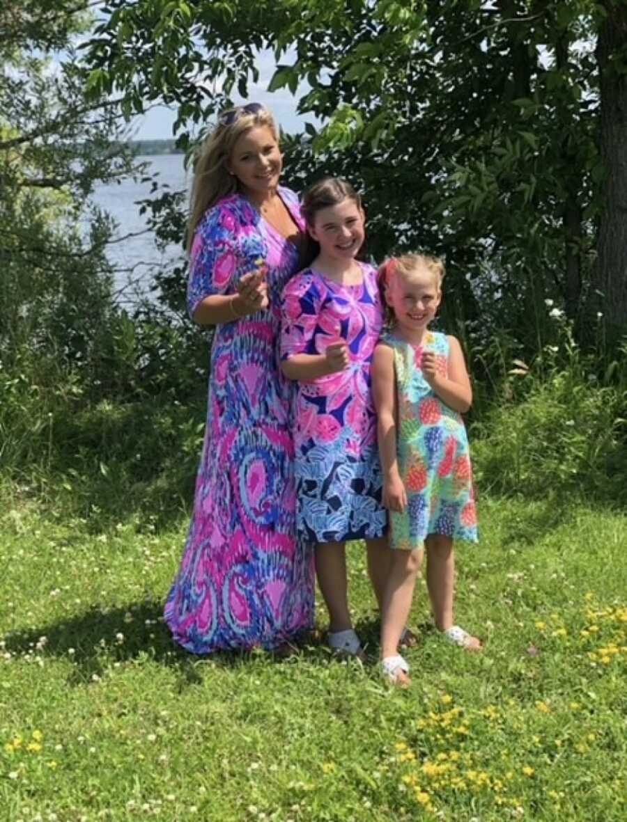 stepmom and daughters in floral dresses