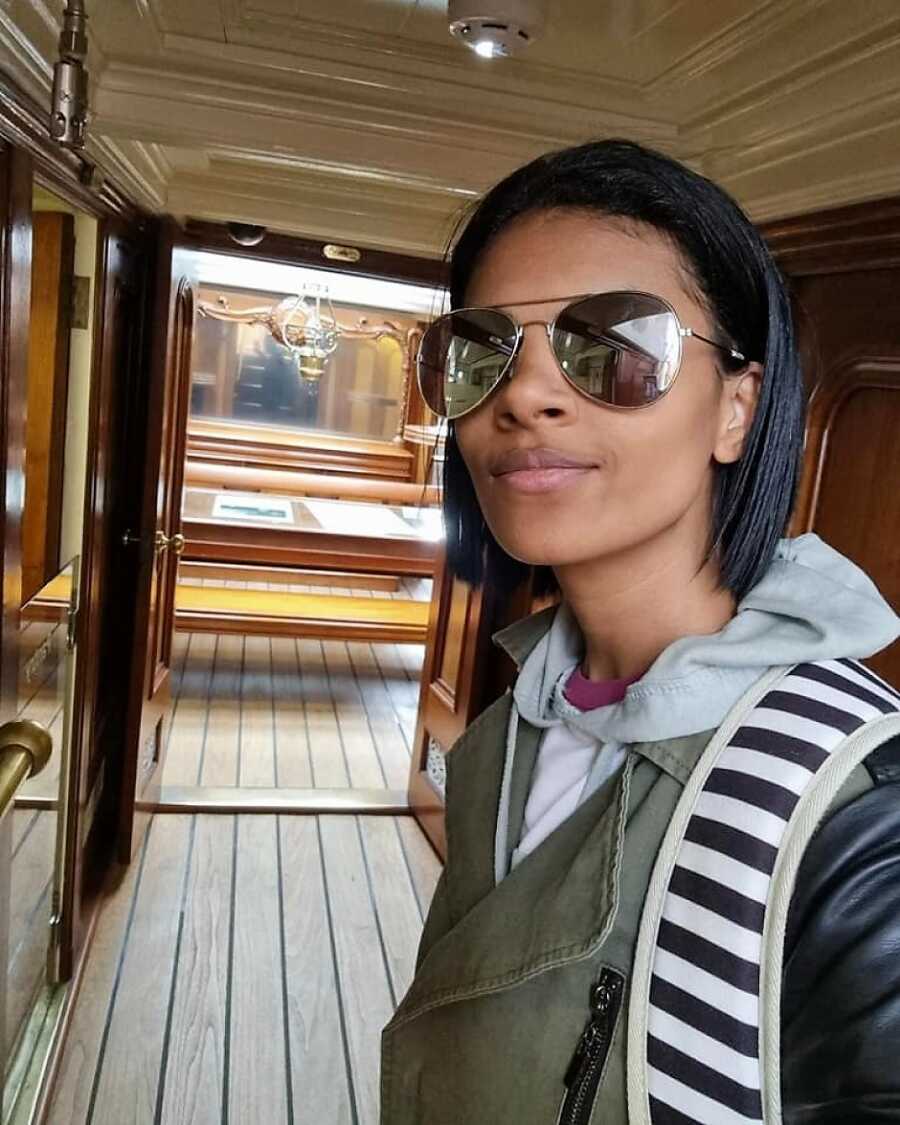 woman taking a selfie on a boat
