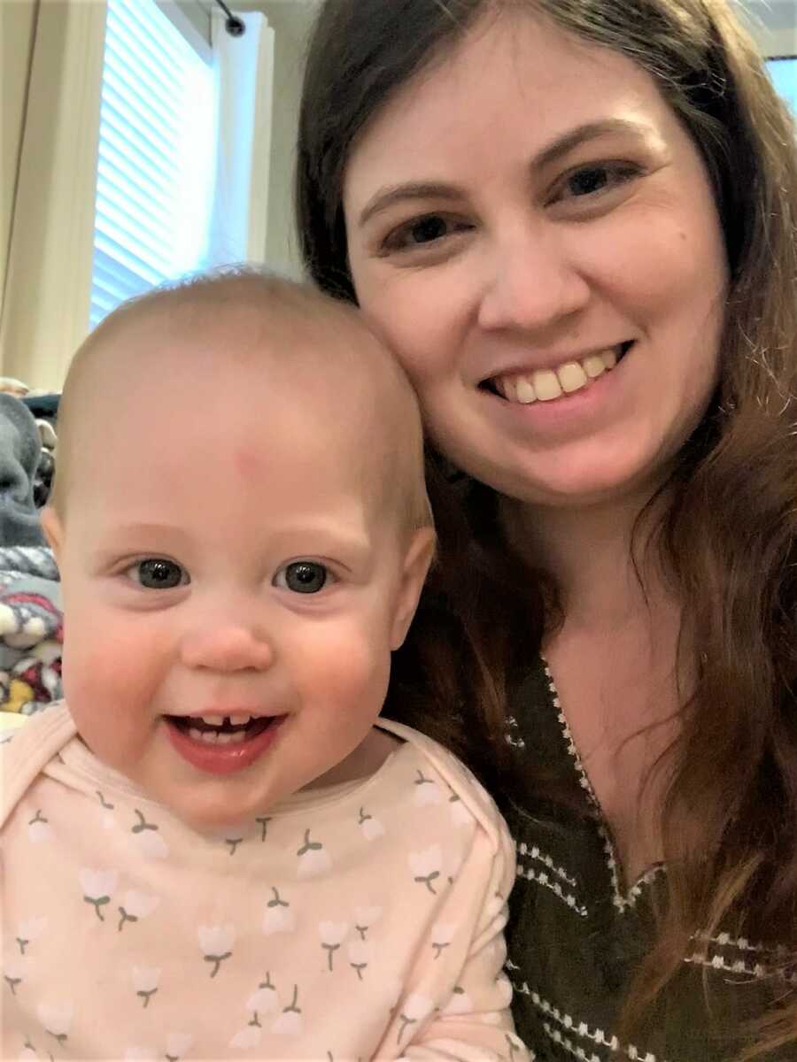 mom and daughter taking a selfie