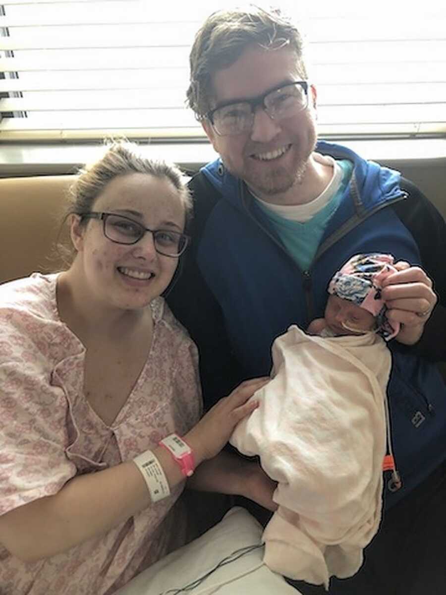 Mother and Father with newborn daughter who was prematurely born