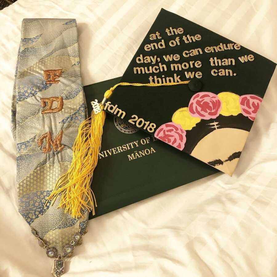 woman's decorated college graduation cap