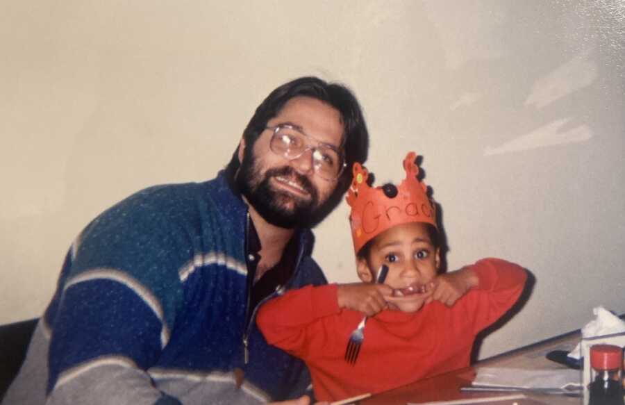 little girl smiling with her dad