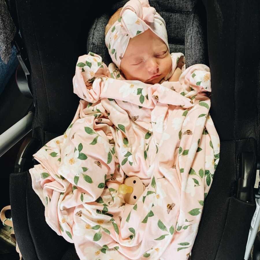 rainbow baby swaddled