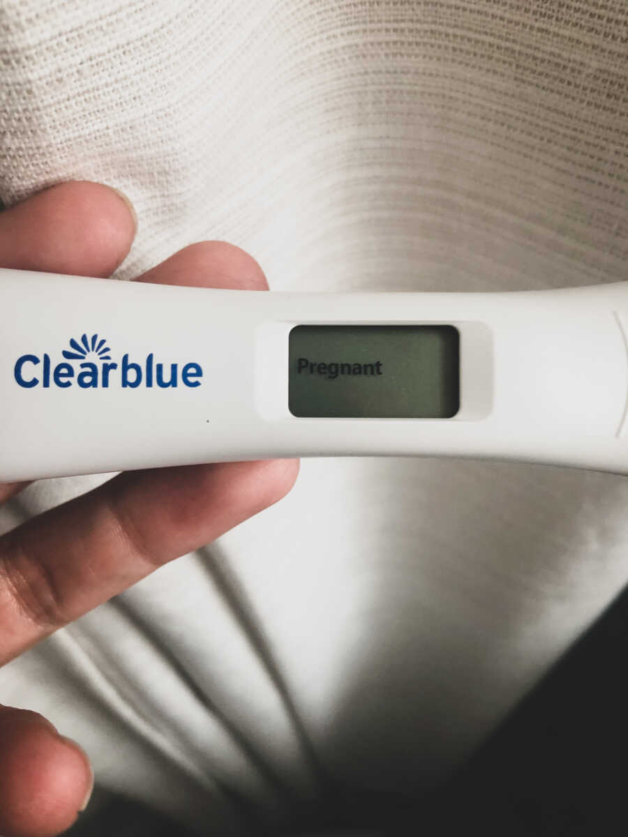 pregnancy test marked "pregnant"