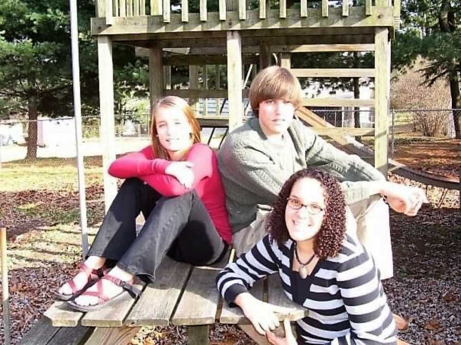 siblings on a playground