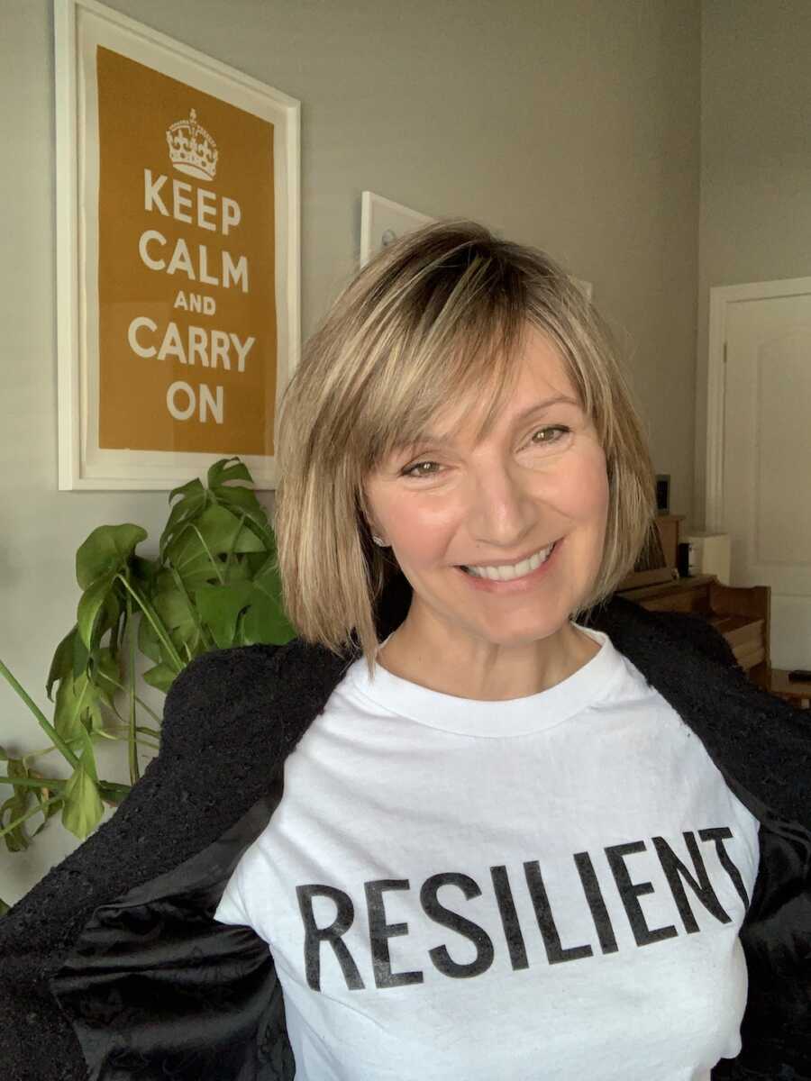 woman wearing a "resilient" shirt
