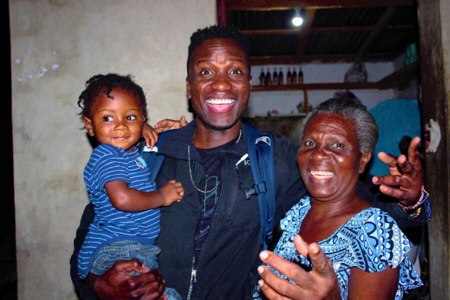 dad grandma and son smiling all together