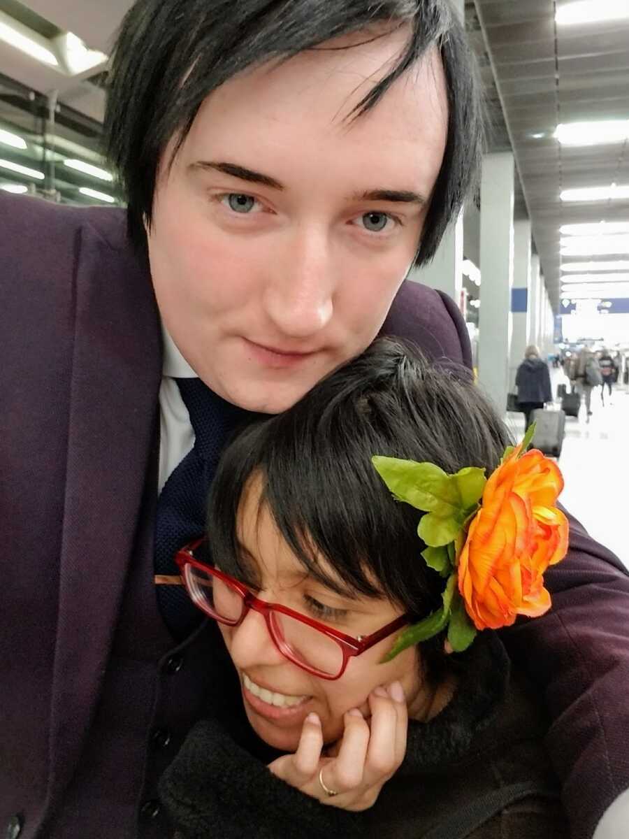 Girlfriend and Boyfriend hugging in airport