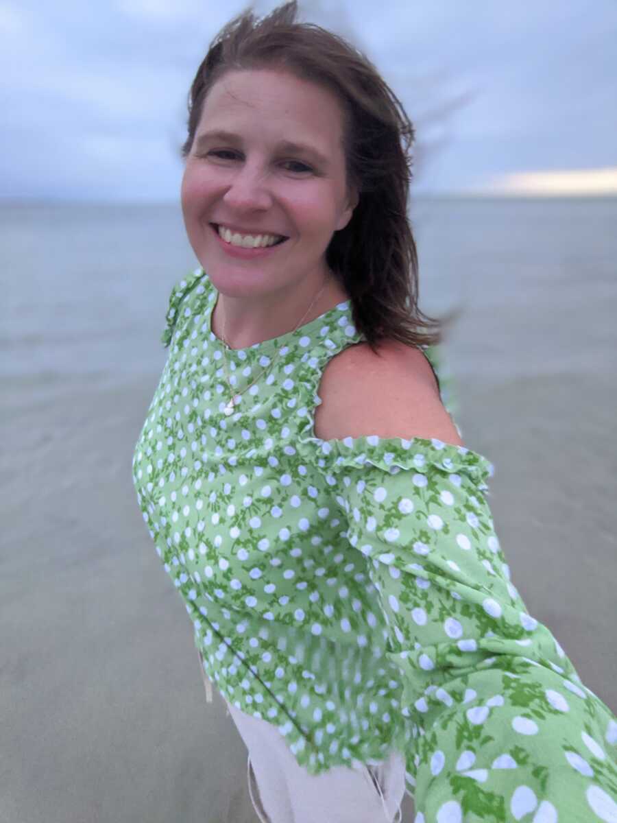 woman taking a selfie on a beach