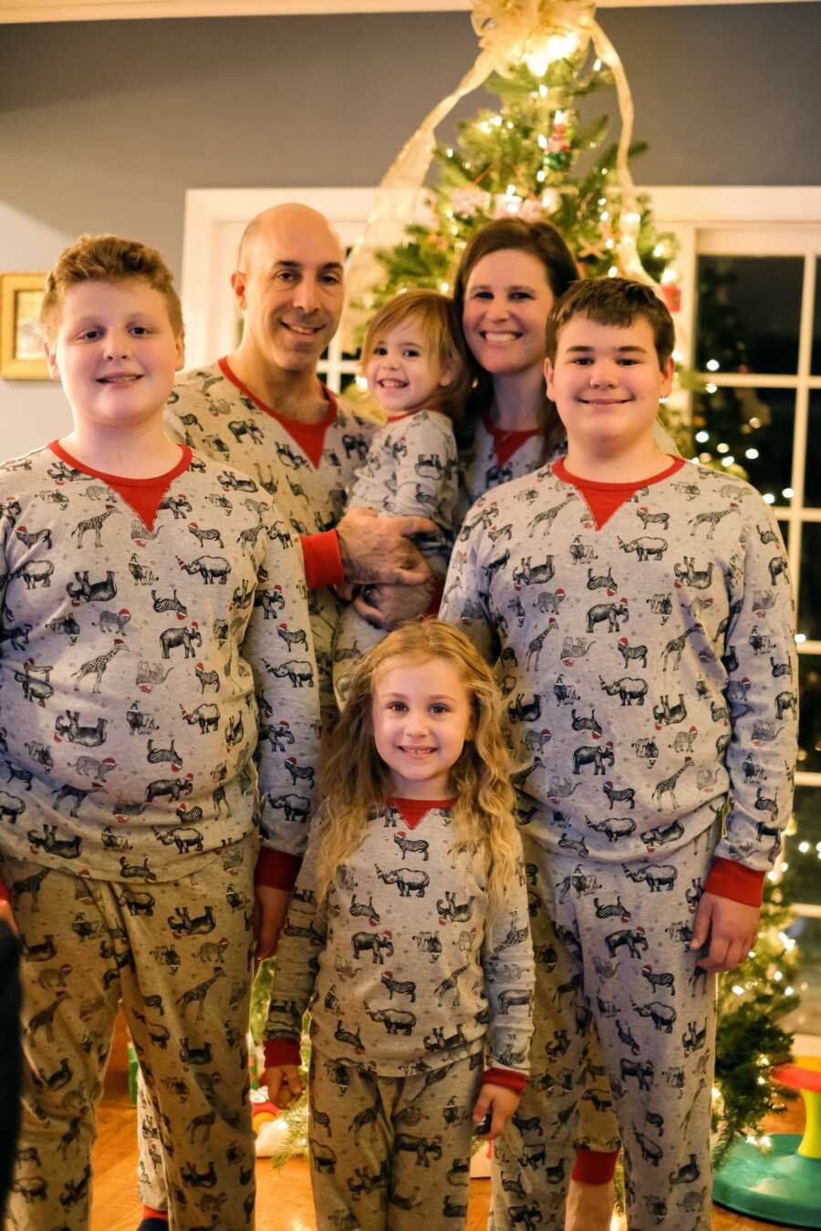 family in matching pjs