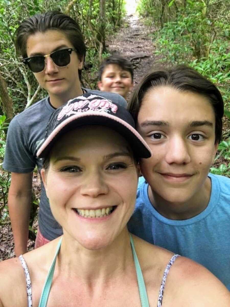 mom on hike with her three sons