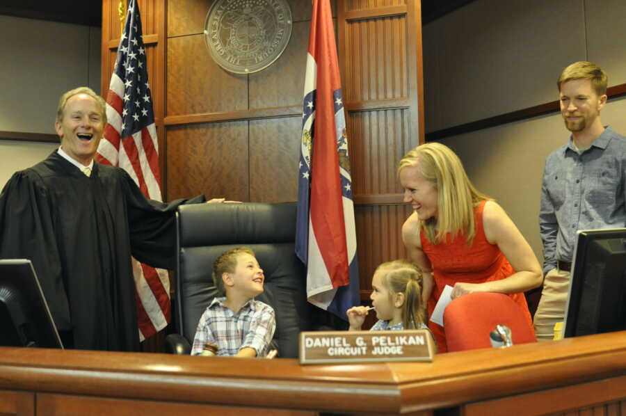 family at children's adoption 