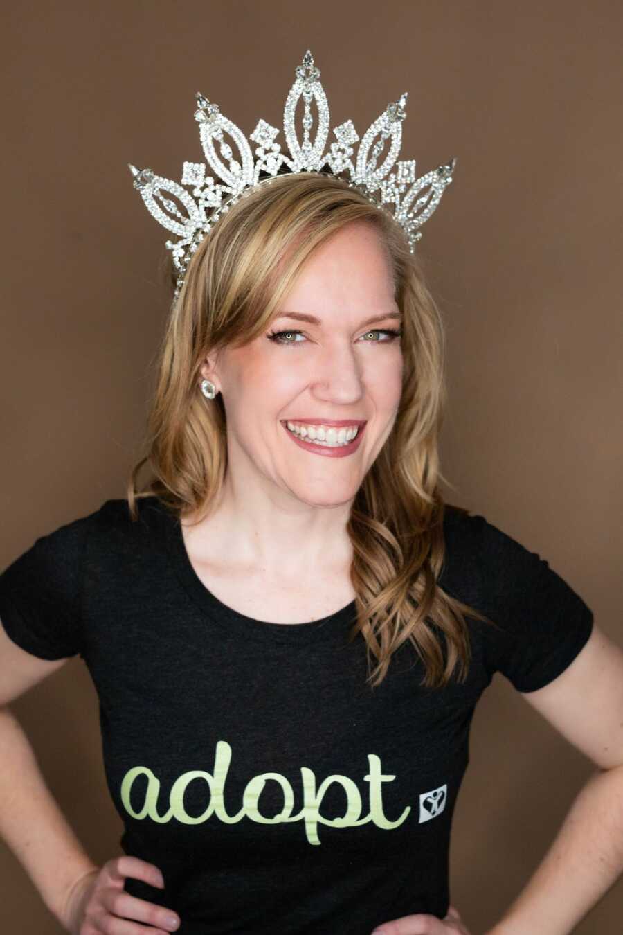 Woman with crown smiling 