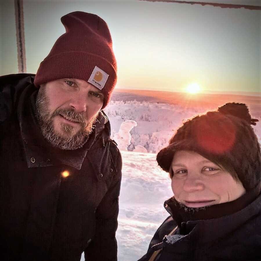 couple on the top of a hike