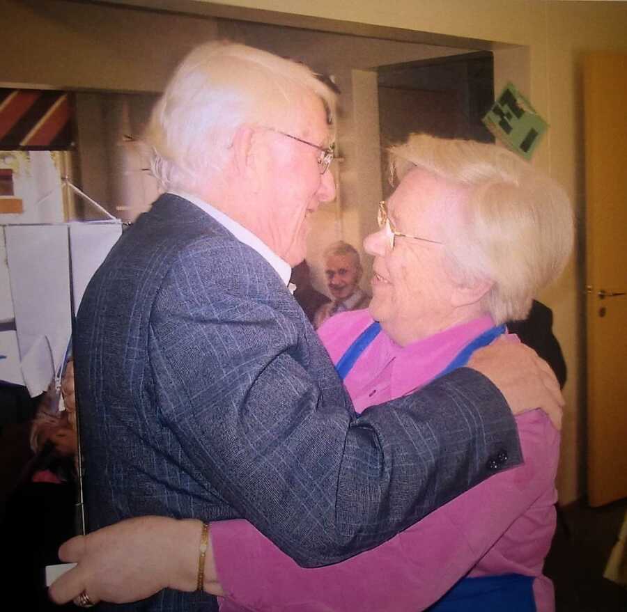 older couple hugging