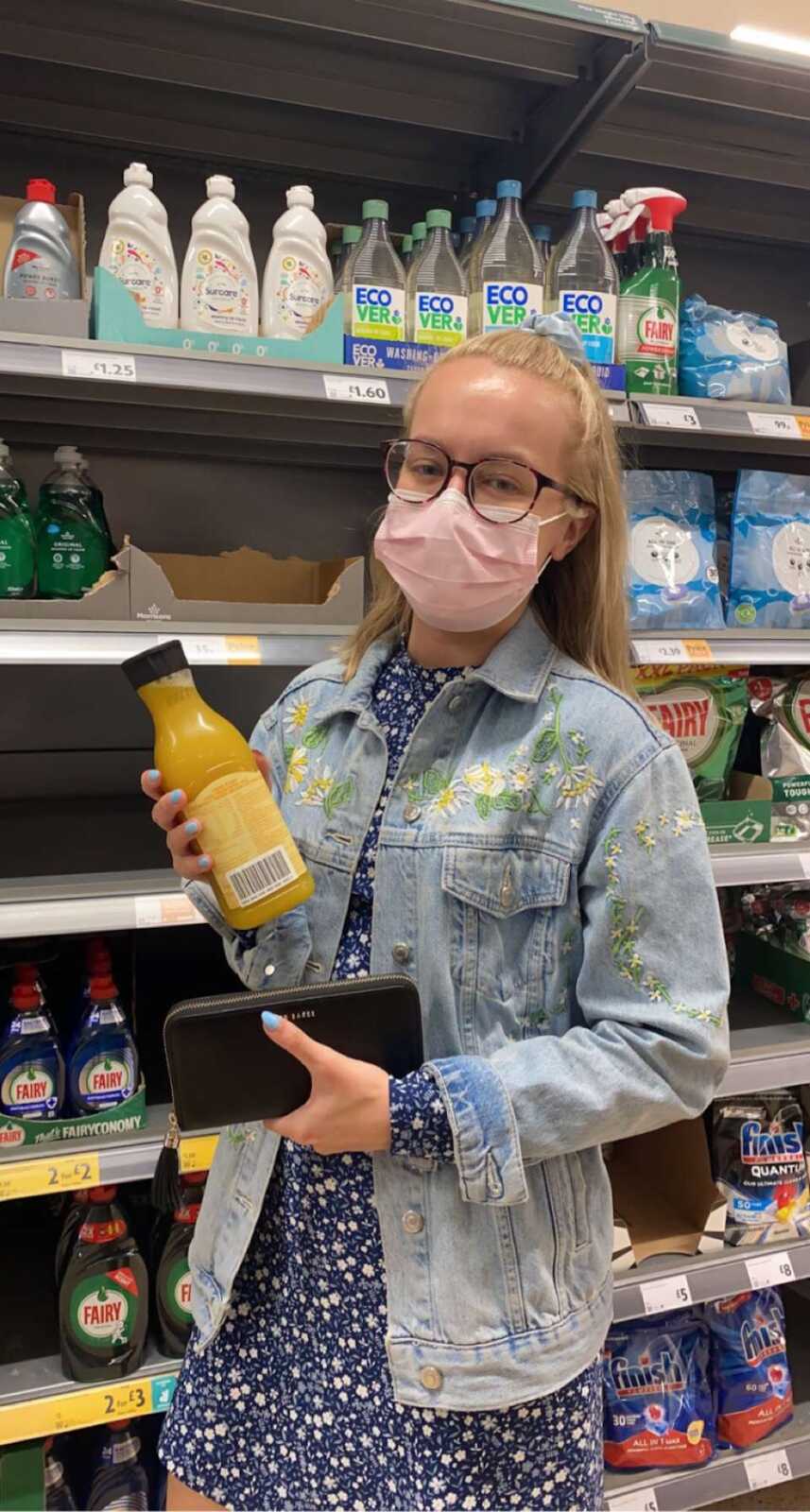 woman in a mask at grocery store