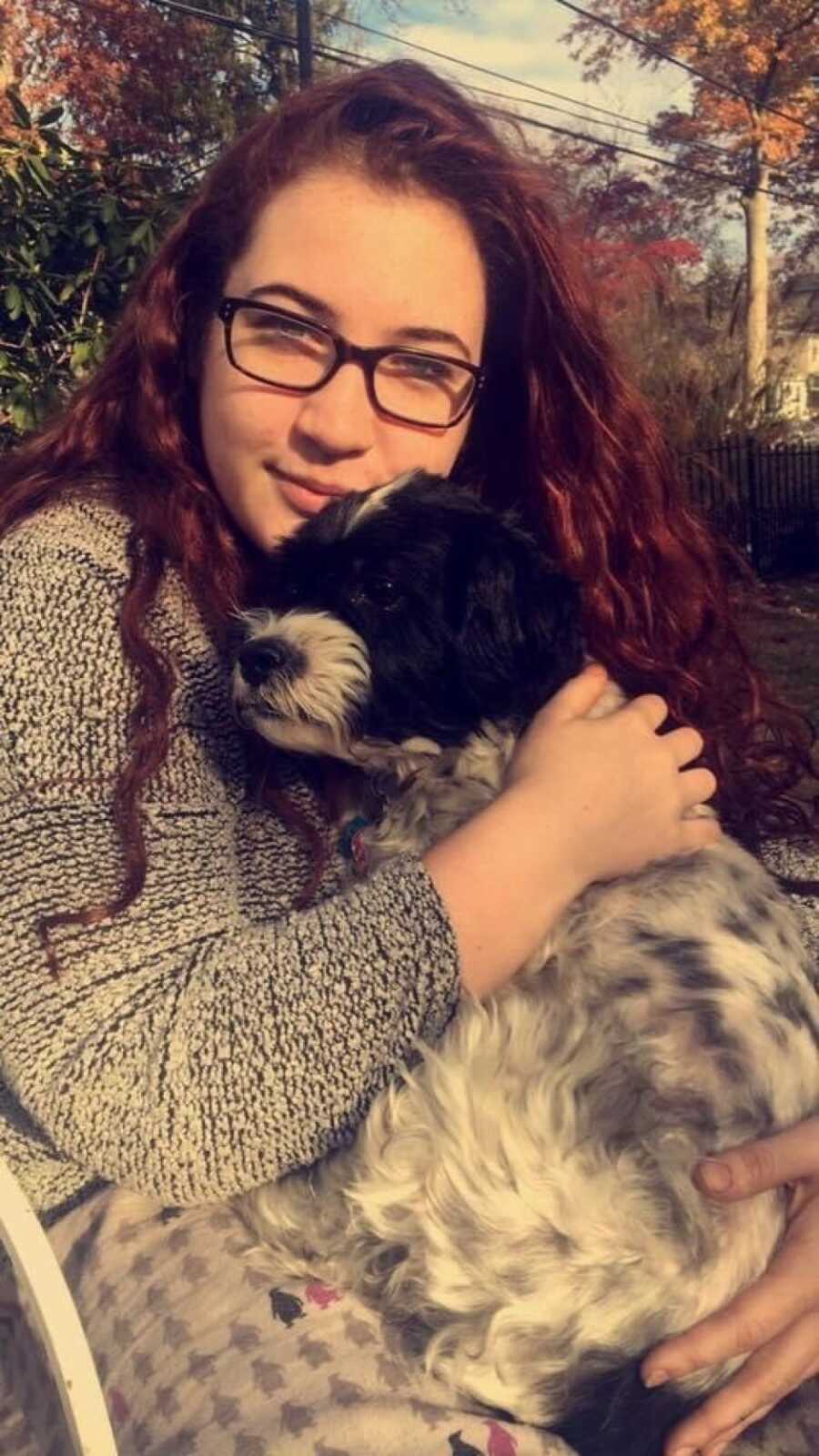 teen girl with her dog