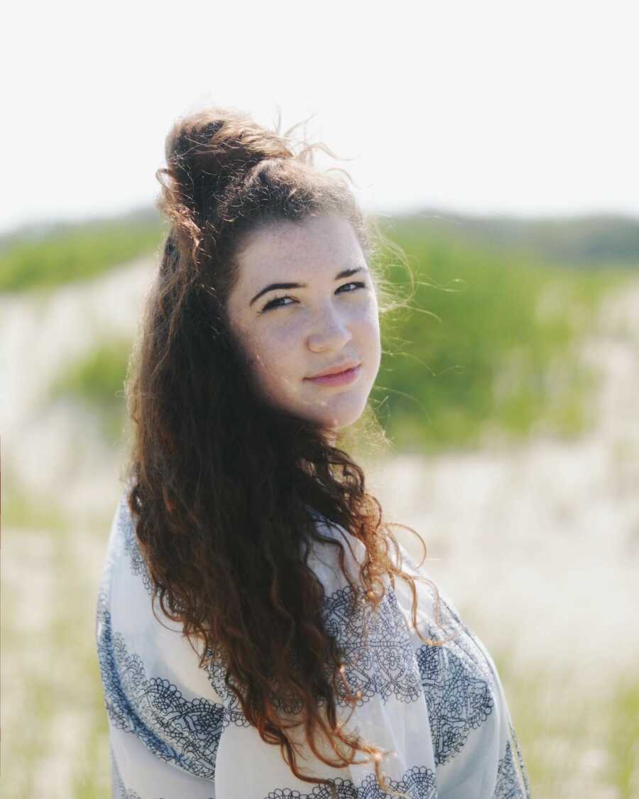 woman letting the wind take her hair