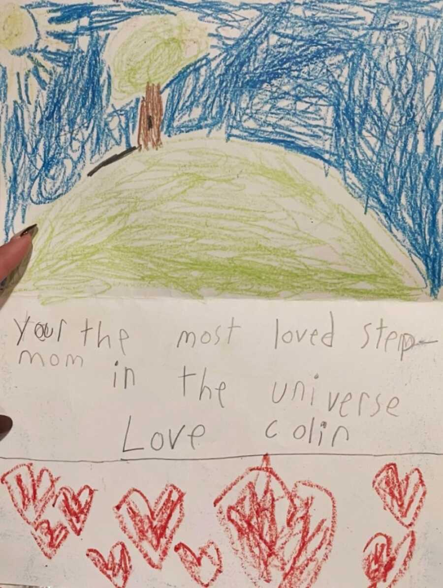 stepchild writing something kind about stepmom