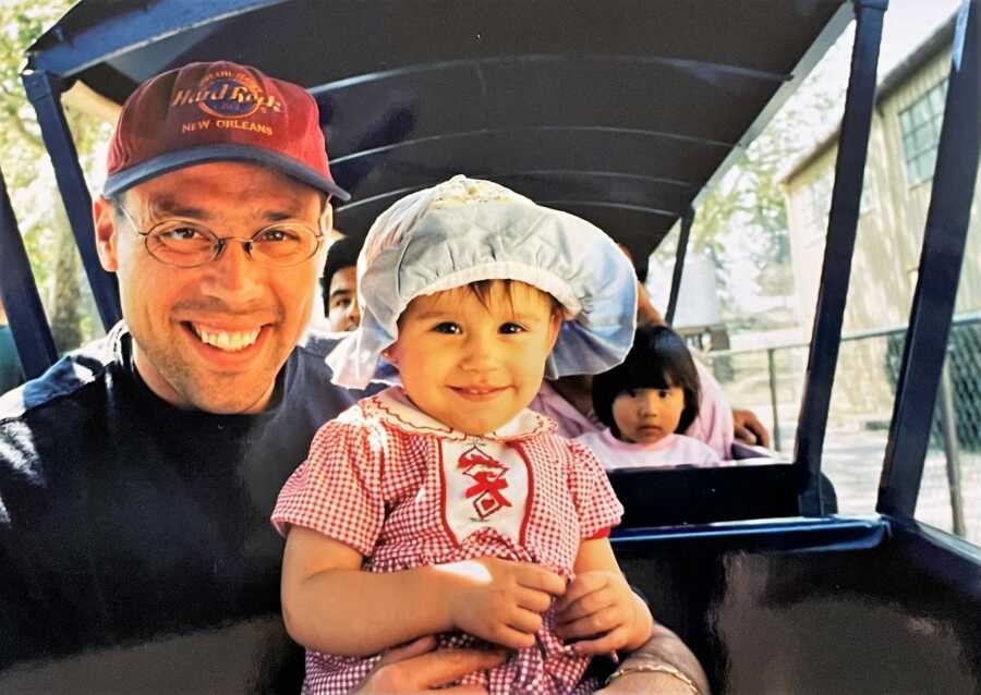 little girl with her stepdad