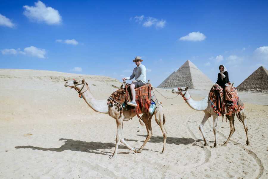 couple on a camel in egypt