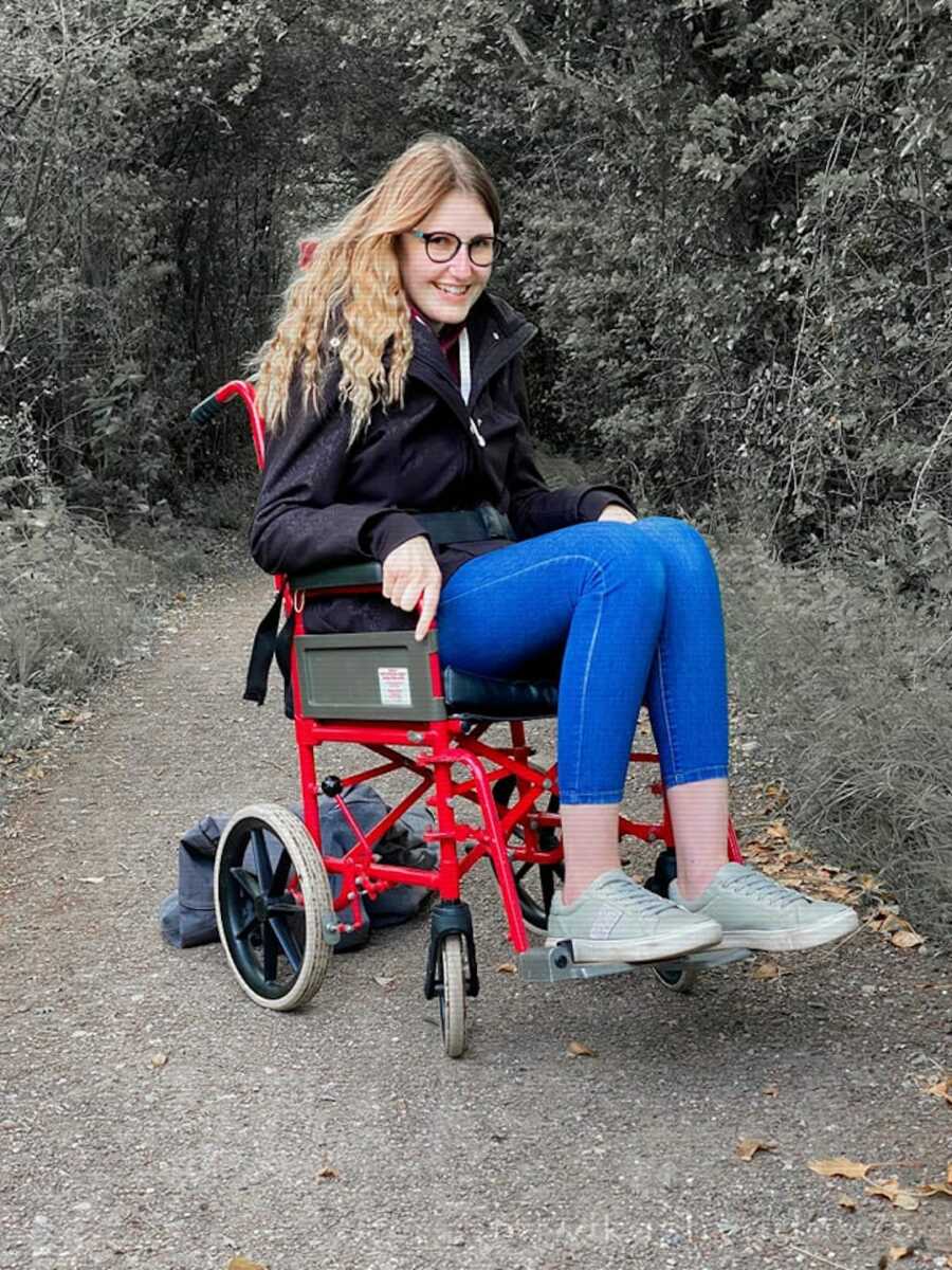 women in wheelchair on trail