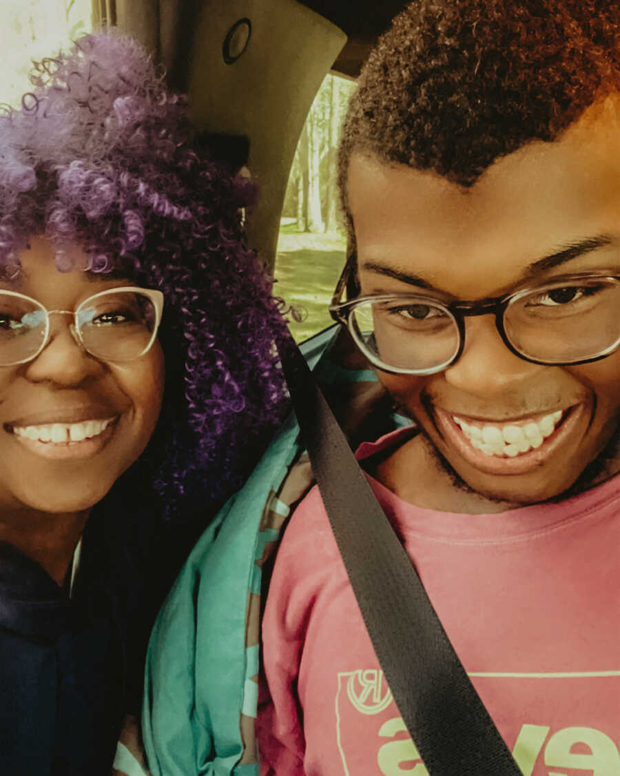 mother and son smiling together