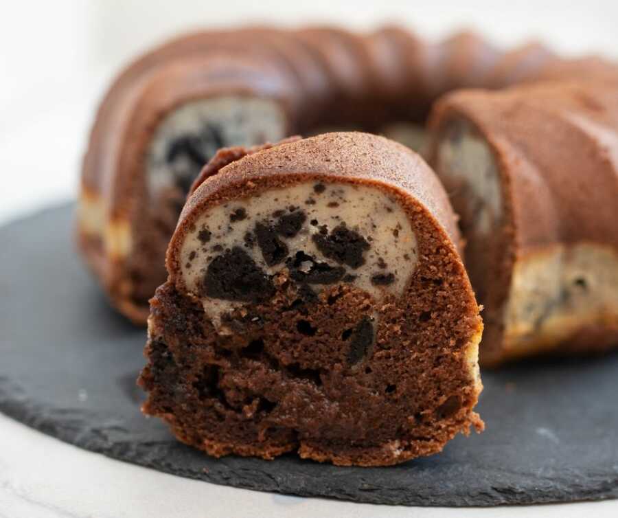 Chocolate bundt cake on gray platter