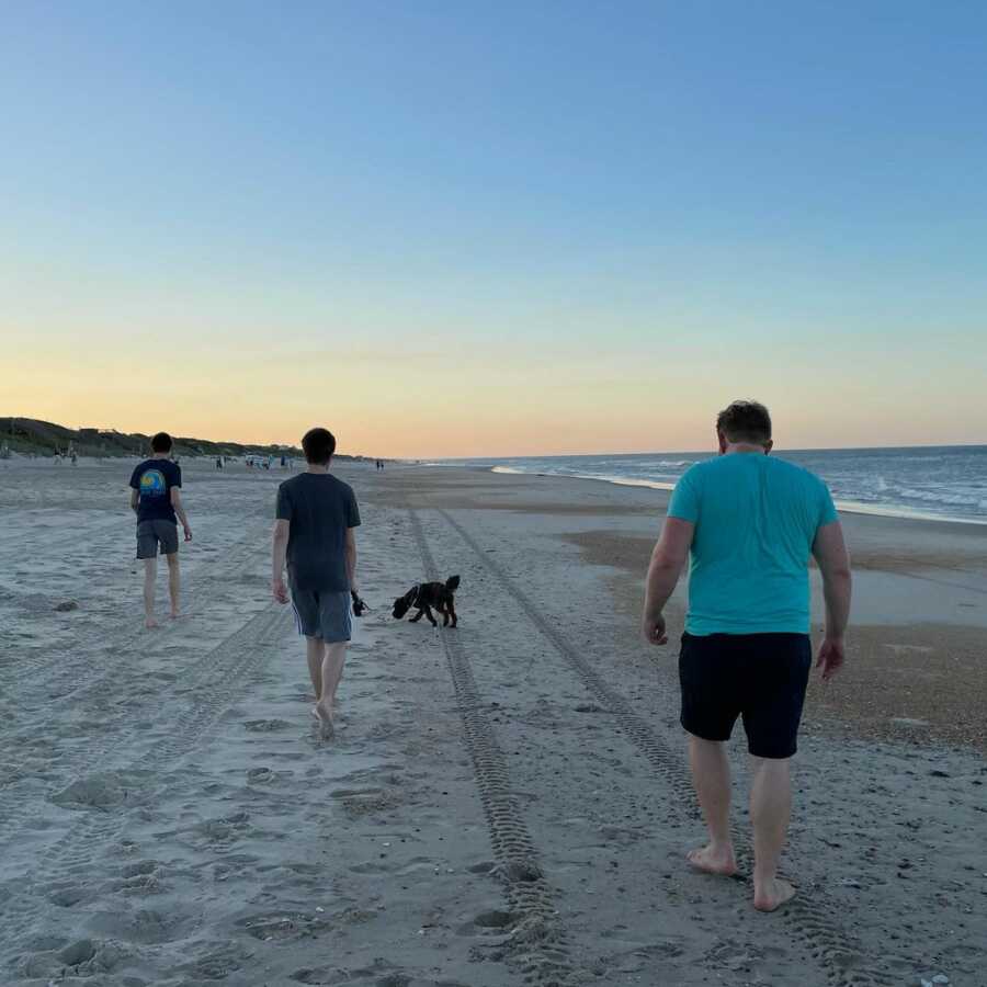 family walking on beach