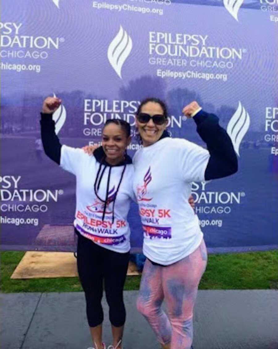 Woman with memory loss poses after a 5k supporting epilepsy research