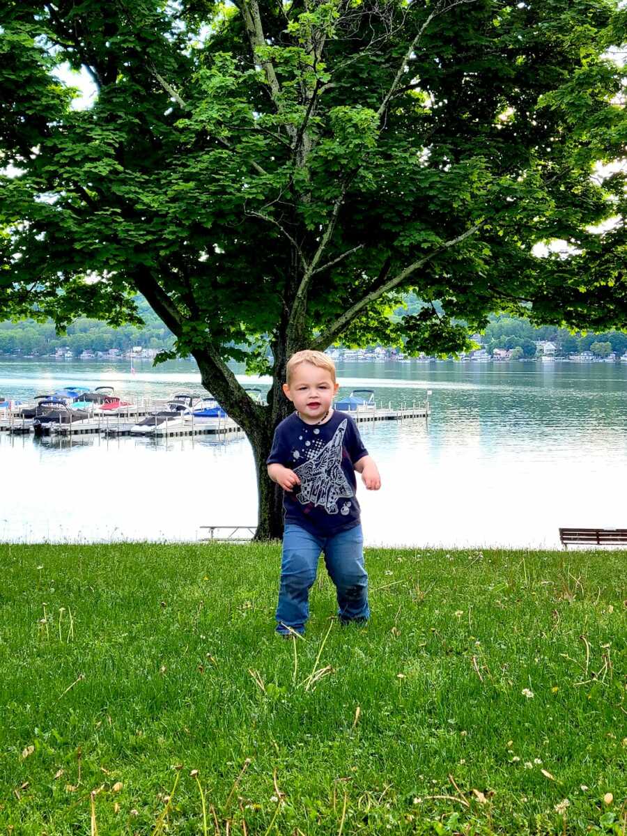 shaken baby syndrome survivor plays outside