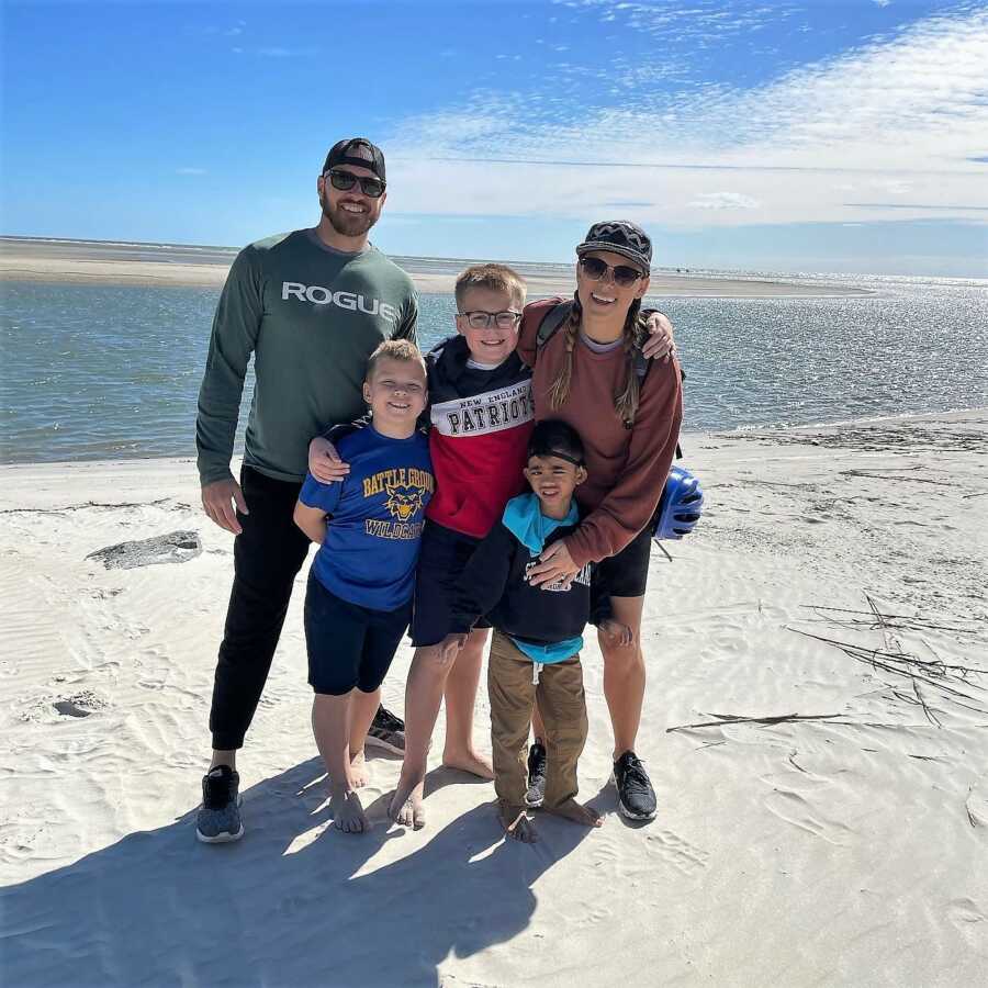 woman with her family at the beach