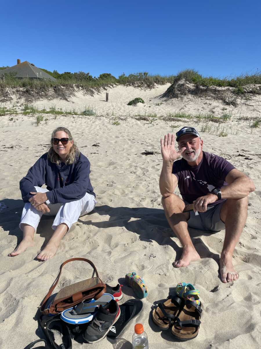 mom and dad on a beach