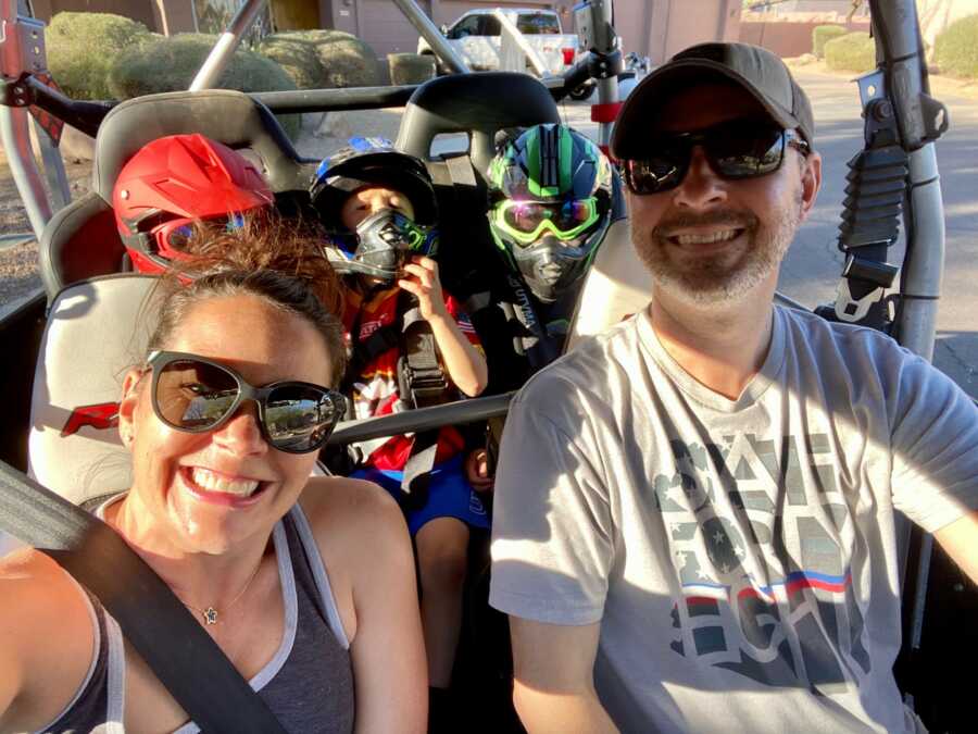 family selfie in the car before dirt biking