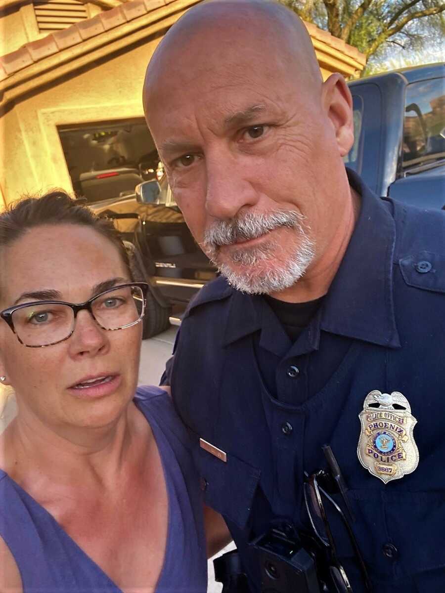 shocked woman taking a selfie with an officer