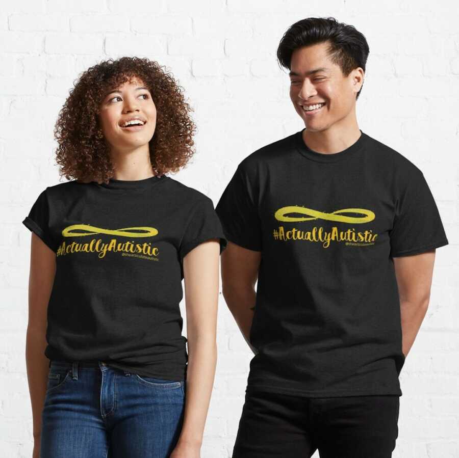 A man and woman pose with t-shirts saying "actually autistic"