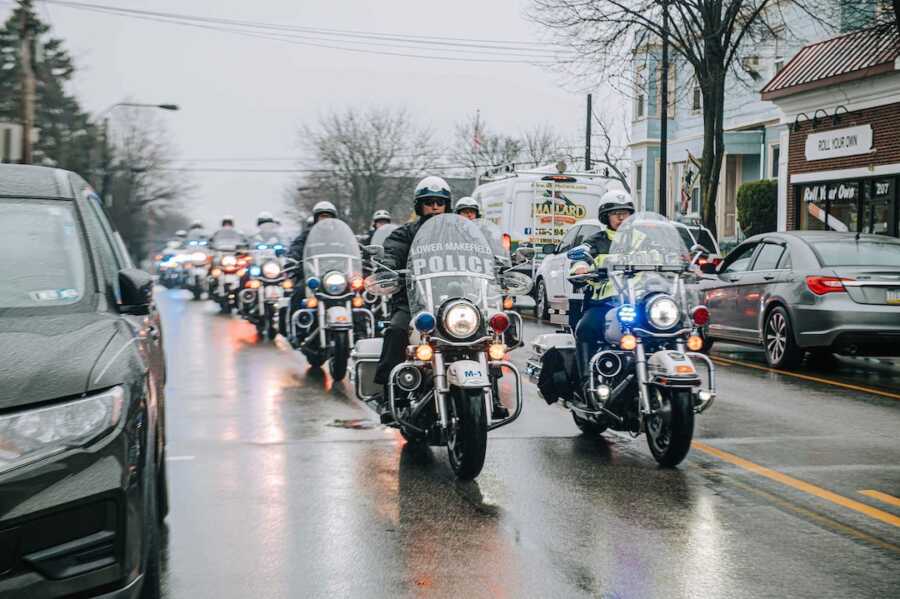 procession of police officers on bikes to honor officer who died