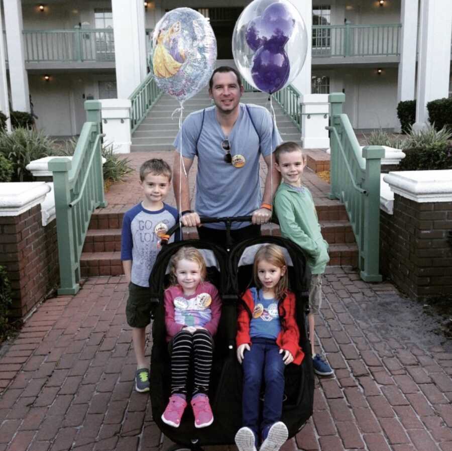 dad with four children at Disney