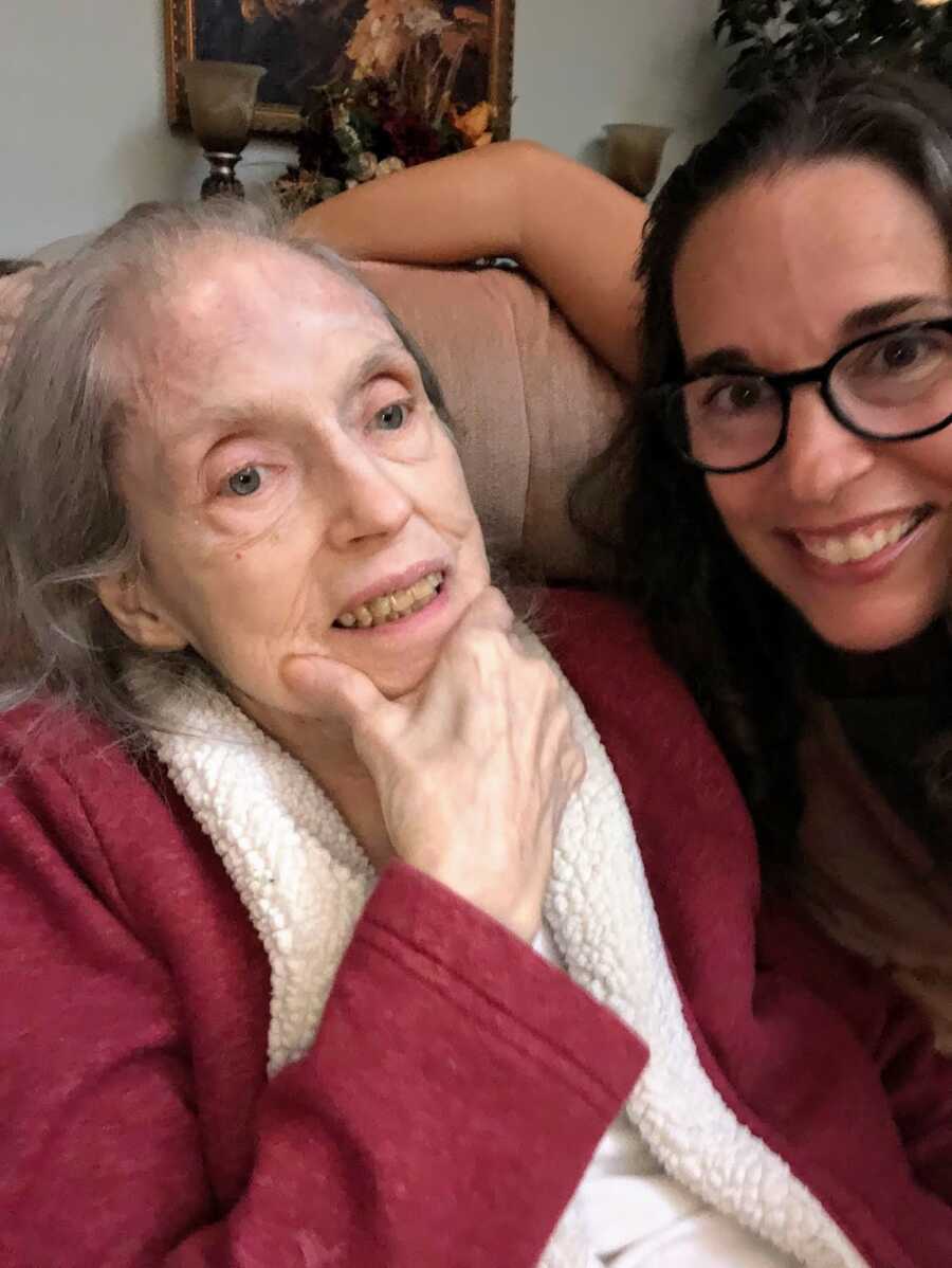 woman sitting with her alzhiemers mother