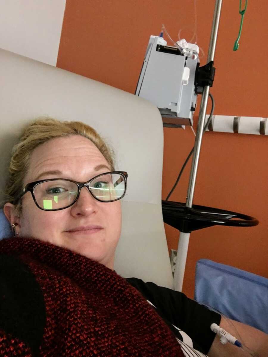 breast cancer patient in hospital bed with an iv