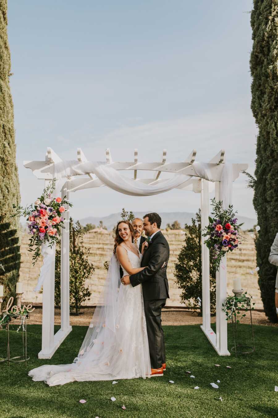 bride and groom at wedding altar during ceremony