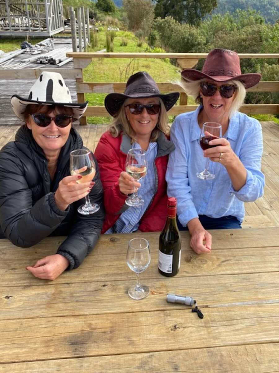 childhood sexual abuse survivor drinking wine with friends