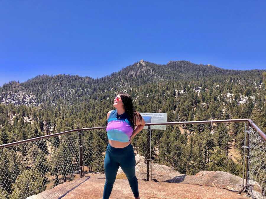 chronically ill woman on hike with mountains